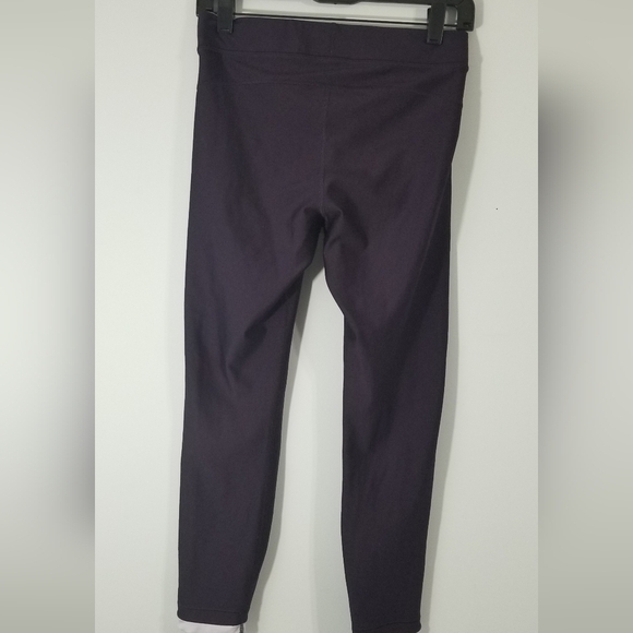 Under Armour Leggings Purple w/ White Hemline Trim and Logo on Leg. EUC. Size S. - Picture 4 of 5